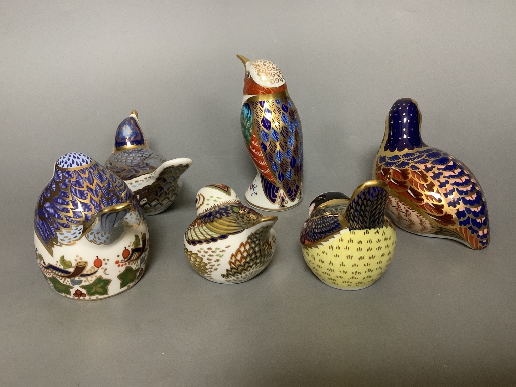 Six Royal Crown Derby bird paperweights, Robin Nesting, Quail (No. 4444/4500), Firecrest (Collectors Guild), Blue Tit, Kingfisher and Bluebird